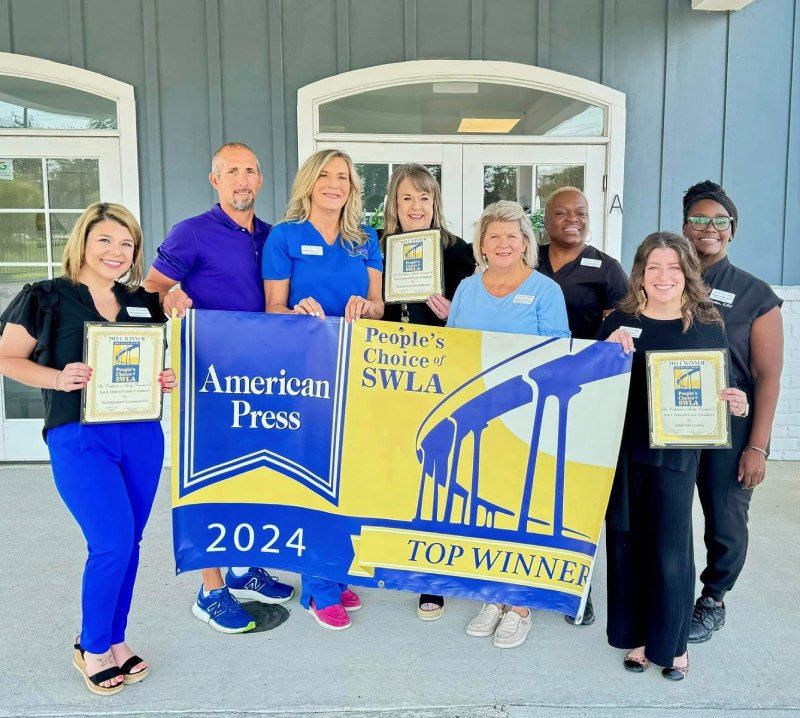 Sage Oak of Lake Charles | Staff holding their award banner