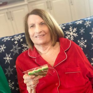 Sage Oak of Lake Charles | Residents with Christmas cookie